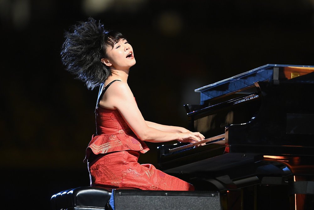 Hiromi performing on tour